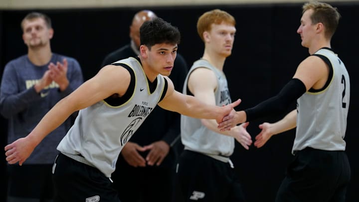 Purdue Boilermakers guard Omer Mayer (17) gets a high five from guard Fletcher Loyer (2) Purdue Boilermakers guard Omer Mayer (17) gets a high five from guard Fletcher Loyer (2)
