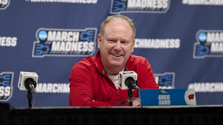 Mar 18, 2026; Portland, OR, USA; Wisconsin Badgers head coach Greg Gard answers questions from the media before a practice session ahead of the first round of the men's 2026 NCAA Tournament at Moda Center. Mandatory Credit: Troy Wayrynen-Imagn Images