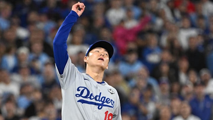 Oct 25, 2025; Toronto, Ontario, CAN; Los Angeles Dodgers pitcher Yoshinobu Yamamoto (18) celebrates after defeating the Toronto Blue Jays in game two of the 2025 MLB World Series at Rogers Centre. Mandatory Credit: Dan Hamilton-Imagn Images Oct 25, 2025; Toronto, Ontario, CAN; Los Angeles Dodgers pitcher Yoshinobu Yamamoto (18) celebrates after defeating the Toronto Blue Jays in game two of the 2025 MLB World Series at Rogers Centre. Mandatory Credit: Dan Hamilton-Imagn Images