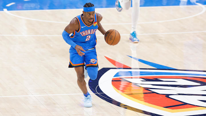 Jun 22, 2025; Oklahoma City, Oklahoma, USA; Oklahoma City Thunder guard Shai Gilgeous-Alexander (2) dribbles the ball against the Indiana Pacers during the first half of game seven of the 2025 NBA Finals at Paycom Center. Mandatory Credit: Alonzo Adams-Imagn Images Jun 22, 2025; Oklahoma City, Oklahoma, USA; Oklahoma City Thunder guard Shai Gilgeous-Alexander (2) dribbles the ball against the Indiana Pacers during the first half of game seven of the 2025 NBA Finals at Paycom Center. Mandatory Credit: Alonzo Adams-Imagn Images