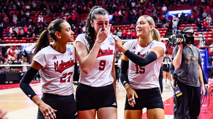 The Huskers walk off the court after finishing their season at 33-1. The Huskers walk off the court after finishing their season at 33-1.