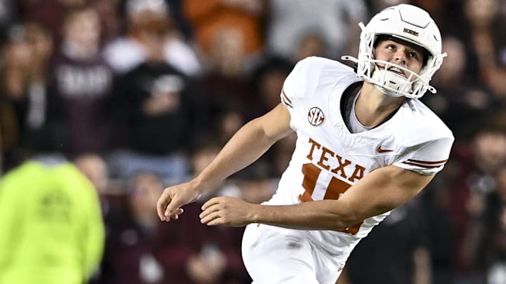 Texas Longhorns place kicker Will Stone kicks the ball during the second quarter against the Texas A&M Aggies. Texas Longhorns place kicker Will Stone kicks the ball during the second quarter against the Texas A&M Aggies.