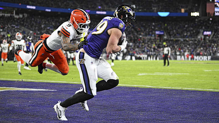 Jan 4, 2025; Baltimore, Maryland, USA; Baltimore Ravens tight end Mark Andrews (89) scores a touch down during the second quarter against Cleveland Browns safety Grant Delpit (9) at M&T Bank Stadium. Mandatory Credit: Tommy Gilligan-Imagn Images