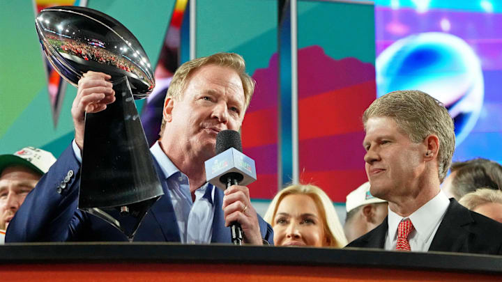 Feb 12, 2023; Glendale, Arizona, US; NFL commissioner Roger Goodell holds the Vince Lombardi Trophy before presending it to Kansas City Chiefs chairman and CEO Clark Hunt for winning Super Bowl LVII against the Philadelphia Eagles at State Farm Stadium. Mandatory Credit: Kirby Lee-Imagn Images
