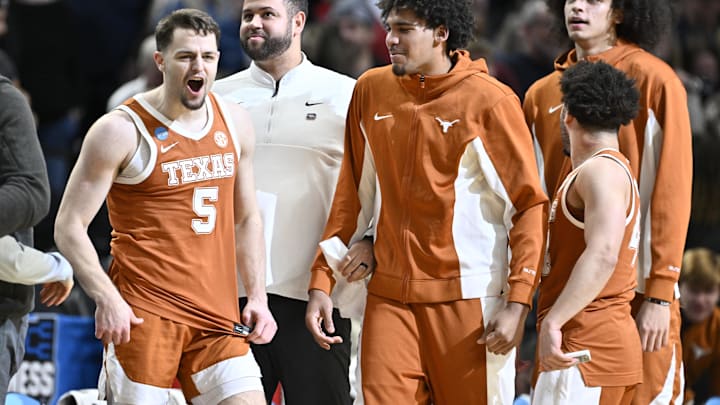 Mar 21, 2026; Portland, OR, USA; Texas Longhorns forward Camden Heide (5) celebrates with teammates after defeating the Gonzaga Bulldogs in a second-round game of the NCAA Tournament. Mar 21, 2026; Portland, OR, USA; Texas Longhorns forward Camden Heide (5) celebrates with teammates after defeating the Gonzaga Bulldogs in a second-round game of the NCAA Tournament.