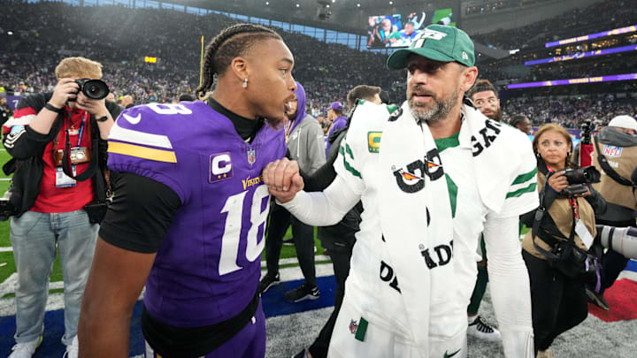 Oct 6, 2024; London, United Kingdom; New York Jets quarterback Aaron Rodgers (8) talks with Minnesota Vikings wide receiver Justin Jefferson (18) after the game at Tottenham Hotspur Stadium. Mandatory Credit: Kirby Lee-Imagn Images Oct 6, 2024; London, United Kingdom; New York Jets quarterback Aaron Rodgers (8) talks with Minnesota Vikings wide receiver Justin Jefferson (18) after the game at Tottenham Hotspur Stadium. Mandatory Credit: Kirby Lee-Imagn Images