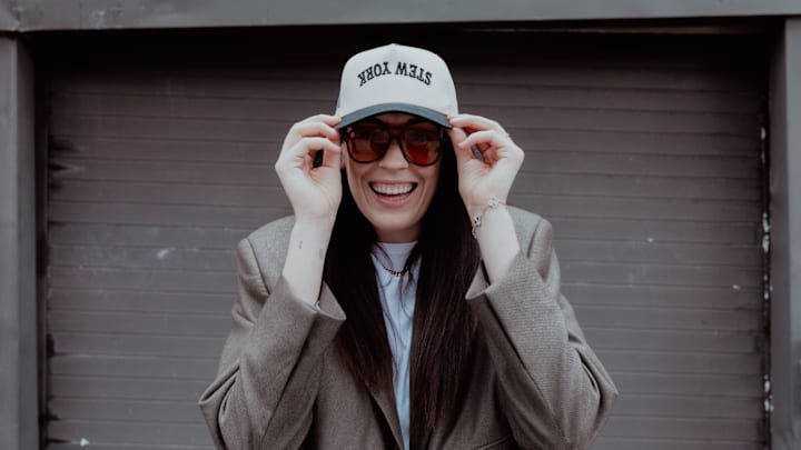 Breanna Stewart wears a hat from her new 'I Love Stew York' line.