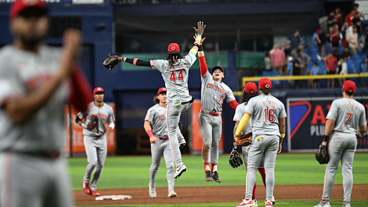 Jul 26, 2024; St. Petersburg, Florida, USA; Members of the Cincinnati Reds  celebrate  after defeating the Tampa Bay Rays at Tropicana Field. Mandatory Credit: Jonathan Dyer-USA TODAY Sports