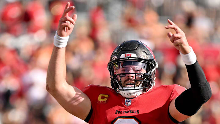Jan 5, 2025; Tampa, Florida, USA; Tampa Bay Buccaneers quarterback Baker Mayfield (6) celebrates after throwing a touchdown pass in the second half against the New Orleans Saints at Raymond James Stadium. Mandatory Credit: Jonathan Dyer-Imagn Images