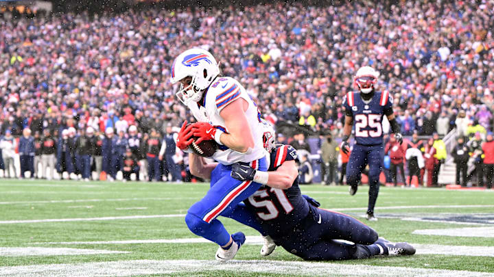 Dec 14, 2025; Foxborough, Massachusetts, USA; Buffalo Bills tight end Dawson Knox (88) scores a touchdown against the New England Patriots during the second half at Gillette Stadium.