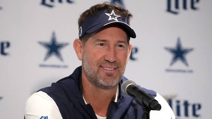 Dallas Cowboys head coach Brian Schottenheimer reacts at a press conference at the Clube de Regatas do Flamengo facility. Dallas Cowboys head coach Brian Schottenheimer reacts at a press conference at the Clube de Regatas do Flamengo facility.