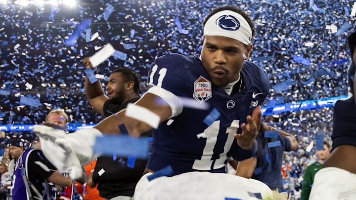 Dec 31, 2024; Glendale, AZ, USA; Penn State Nittany Lions defensive end Abdul Carter (11) celebrates with the Heisman pose after defeating the Boise State Broncos in the Fiesta Bowl at State Farm Stadium. Mandatory Credit: Mark J. Rebilas-Imagn Images