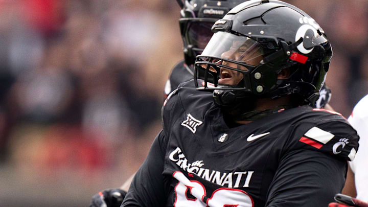 Cincinnati Bearcats defensive lineman Jalen Hunt (90) reacts after sacking Arizona Wildcats quarterback Noah Fifita (1) in the first quarter of the NCAA football game at Nippert Stadium in Cincinnati on Nov. 15, 2025.