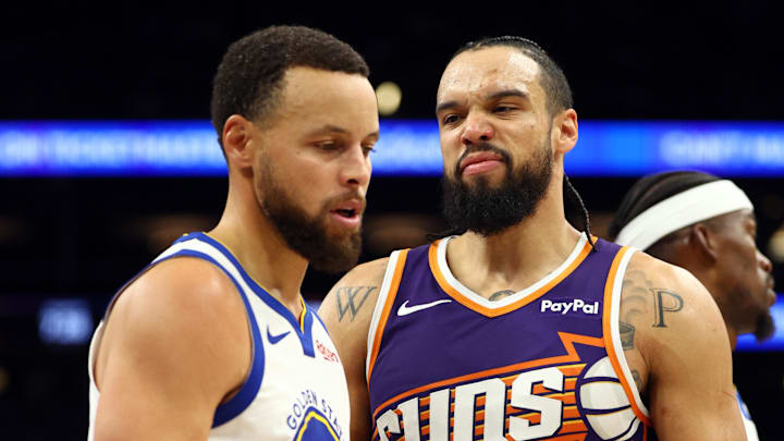 Dec 18, 2025; Phoenix, Arizona, USA; Golden State Warriors guard Stephen Curry (30) against Phoenix Suns forward Dillon Brooks (3) at Mortgage Matchup Center. Mandatory Credit: Mark J. Rebilas-Imagn Images