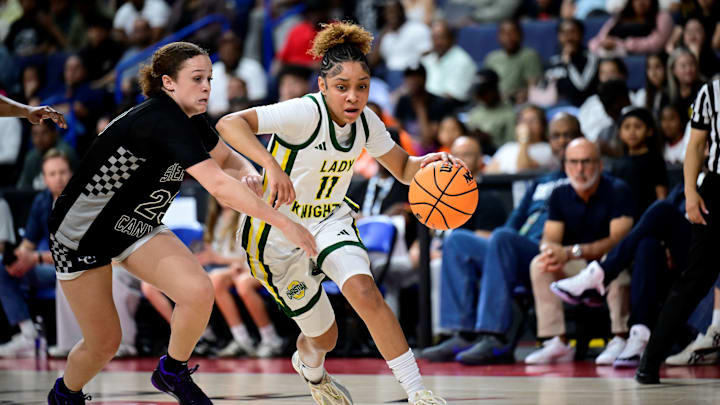 Ontario Christian's Kaleena Smith drives to the hoop against a Sierra Canyon defender in the CIF Southern Section Open Division final on Feb. 28, 2026. She leads her team into the state finals 6 p.m. Saturday against Mitty with a possible mythical national championship on the line. 