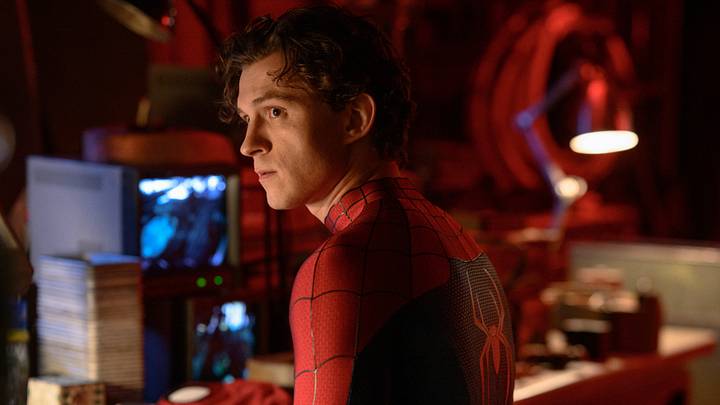 Peter Parker/Spider-Man (Tom Holland) works at his desk in Columbia Pictures SPIDER-MAN™: BRAND NEW DAY