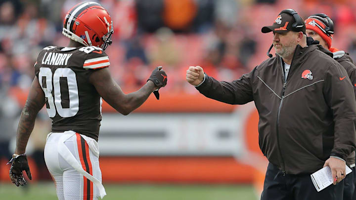 Cleveland Browns wide receiver Jarvis Landry (80) fist bumps offensive coordinator Alex Van Pelt as