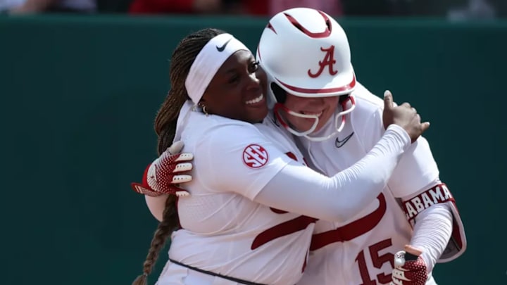 Alabama Softball Player Vic Moten (0) and Alabama Softball Player Brooke Wells (15) in action against St. Thomas at Rhoads Stadium in Tuscaloosa, AL on Sunday, Mar 1, 2026.