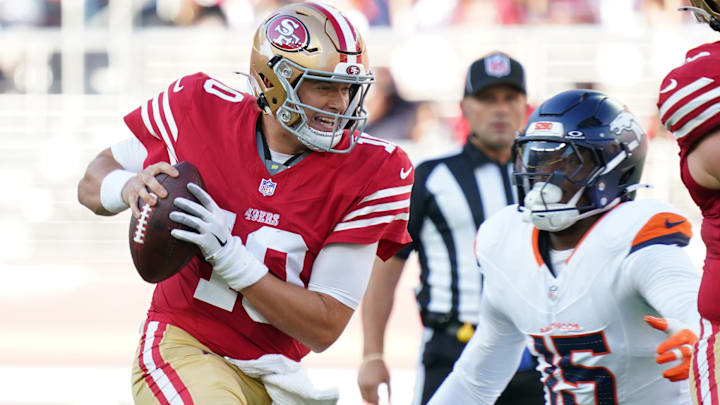 Aug 9, 2025; Santa Clara, California, USA; San Francisco 49ers quarterback Mac Jones (10) scrambles away from Denver Broncos outside linebacker Nik Bonitto (15) in the first quarter at Levi's Stadium. Aug 9, 2025; Santa Clara, California, USA; San Francisco 49ers quarterback Mac Jones (10) scrambles away from Denver Broncos outside linebacker Nik Bonitto (15) in the first quarter at Levi's Stadium.