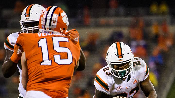 Oct 10, 2020; Clemson, South Carolina, USA; Miami Hurricanes running back Cam'Ron Harris (23) runs against Clemson Tigers linebacker Jake Venables (15) during the fourth quarter at Memorial Stadium. Mandatory Credit: Ken Ruinard-USA TODAY Sports Oct 10, 2020; Clemson, South Carolina, USA; Miami Hurricanes running back Cam'Ron Harris (23) runs against Clemson Tigers linebacker Jake Venables (15) during the fourth quarter at Memorial Stadium. Mandatory Credit: Ken Ruinard-USA TODAY Sports