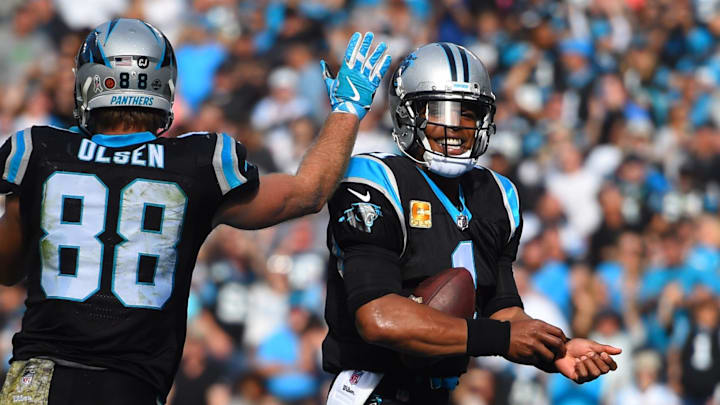 Nov 4, 2018; Charlotte, NC, USA; Carolina Panthers tight end Greg Olsen (88) reacts with quarterback Cam Newton (1) after scoring a touchdown in the second quarter at Bank of America Stadium. Mandatory Credit: Bob Donnan-Imagn Images