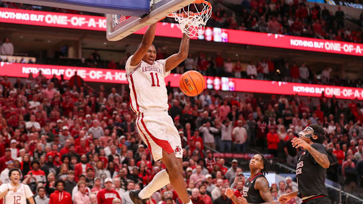 Arkansas' Karter Knox finishes an alley-oop against Texas Tech during a non-conference men's basketball game, Saturday, Dec. 13, 2025, in American Airlines Center in Dallas. Arkansas' Karter Knox finishes an alley-oop against Texas Tech during a non-conference men's basketball game, Saturday, Dec. 13, 2025, in American Airlines Center in Dallas.