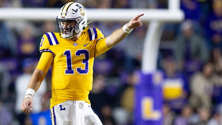 Nov 23, 2024; Baton Rouge, Louisiana, USA;  LSU Tigers quarterback Garrett Nussmeier (13) signals a first down against the Vanderbilt Commodores during the second half at Tiger Stadium. Mandatory Credit: Stephen Lew-Imagn Images