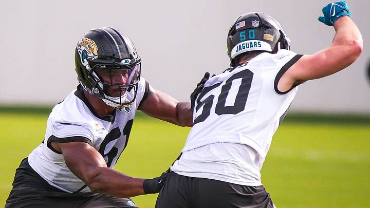 Jaguars linebacker Ventral Miller (51) pushes off linebacker Branson Combs (50) while running drills during the Jaguars’ fourth OTA of the year, Monday June 1, 2026 at the Miller Electric Center in Jacksonville, Fla. [Doug Engle/Florida Times-Union]