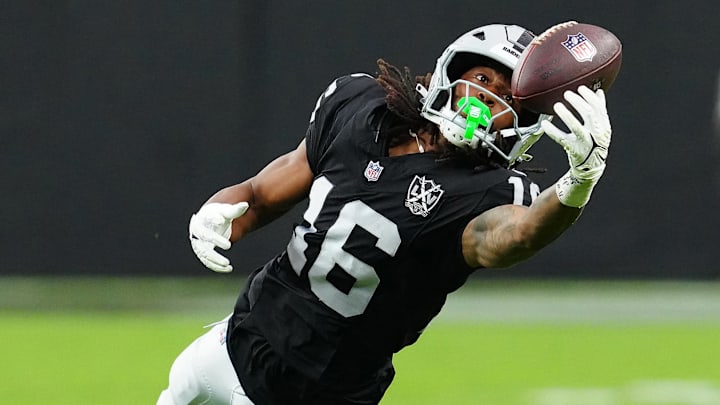 Sep 29, 2024; Paradise, Nevada, USA; Las Vegas Raiders wide receiver Jakobi Meyers (16) attempts to make a catch against the Cleveland Browns during the third quarter at Allegiant Stadium. Sep 29, 2024; Paradise, Nevada, USA; Las Vegas Raiders wide receiver Jakobi Meyers (16) attempts to make a catch against the Cleveland Browns during the third quarter at Allegiant Stadium.