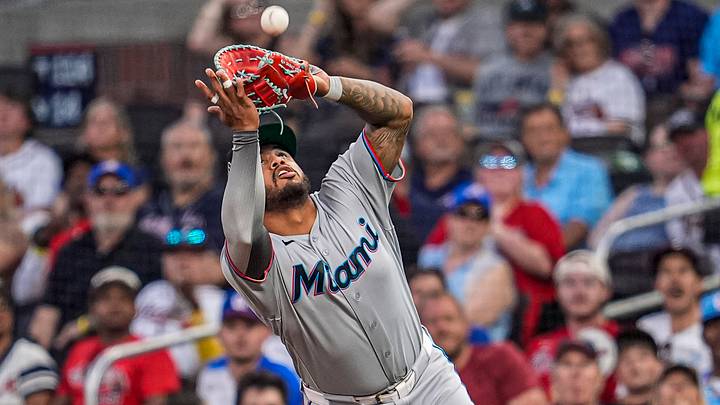 Apr 15, 2026: Miami Marlins first baseman Deyvison de Los Santos catches a pop up against the Atlanta Braves during the third inning at Truist Park.Credit: Dale Zanine-Imagn Images