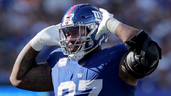Sep 28, 2025; East Rutherford, New Jersey, USA; New York Giants defensive tackle Dexter Lawrence (97) reacts during the fourth quarter against the Los Angeles Chargers at MetLife Stadium. Sep 28, 2025; East Rutherford, New Jersey, USA; New York Giants defensive tackle Dexter Lawrence (97) reacts during the fourth quarter against the Los Angeles Chargers at MetLife Stadium.