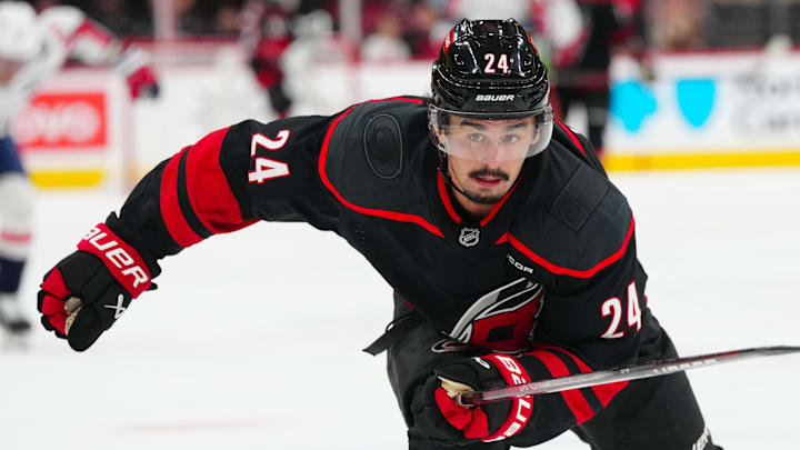Nov 3, 2024; Raleigh, North Carolina, USA;  Carolina Hurricanes center Seth Jarvis (24) skates against the Washington Capitals during the first period at Lenovo Center. Mandatory Credit: James Guillory-Imagn Images