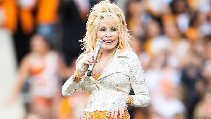Dolly Parton performs Rocky Top at the end of the first quarter of a football game between Tennessee and Georgia at Neyland Stadium in Knoxville, Tenn., on Saturday, Nov. 18, 2023. Dolly Parton performs Rocky Top at the end of the first quarter of a football game between Tennessee and Georgia at Neyland Stadium in Knoxville, Tenn., on Saturday, Nov. 18, 2023.