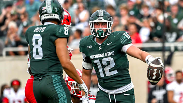 Michigan State's Jack Velling, right, celebrates a first down against Youngstown State during the second quarter on Saturday, Sept. 13, 2025, at Spartan Stadium in East Lansing.