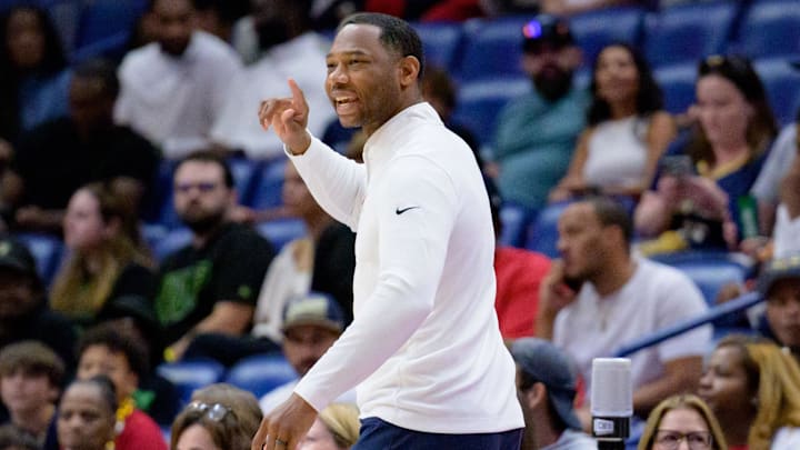 Oct 7, 2024; New Orleans, Louisiana, USA; New Orleans Pelicans head coach Willie Green reacts against the Orlando Magic during the first half at Smoothie King Center.