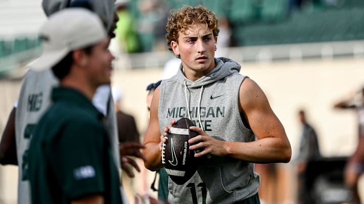 Michigan State's quarterback Alessio Milivojevic warms up before the football game against Western Michigan on Friday, Aug. 29, 2025, in East Lansing. Michigan State's quarterback Alessio Milivojevic warms up before the football game against Western Michigan on Friday, Aug. 29, 2025, in East Lansing.