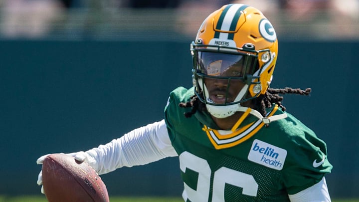 Green Bay Packers safety Darnell Savage (26) turns and runs upfield after catching a pass during
