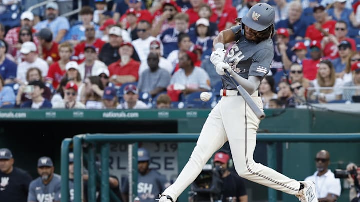 Sep 28, 2024; Washington, District of Columbia, USA; Washington Nationals outfielder James Wood (29) hits a two run home run against the Philadelphia Phillies during the sixth inning at Nationals Park. Sep 28, 2024; Washington, District of Columbia, USA; Washington Nationals outfielder James Wood (29) hits a two run home run against the Philadelphia Phillies during the sixth inning at Nationals Park.