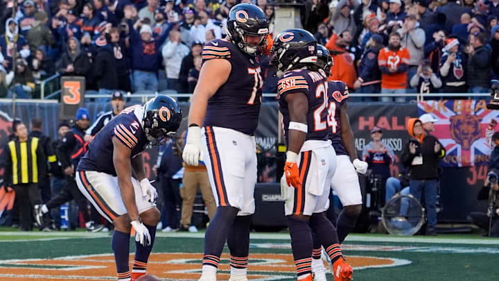Ozzy Trapilo and Kyle Monangai celebrate a touchdown in Sunday's 31-28 Bears win over Pittsburgh. Ozzy Trapilo and Kyle Monangai celebrate a touchdown in Sunday's 31-28 Bears win over Pittsburgh.