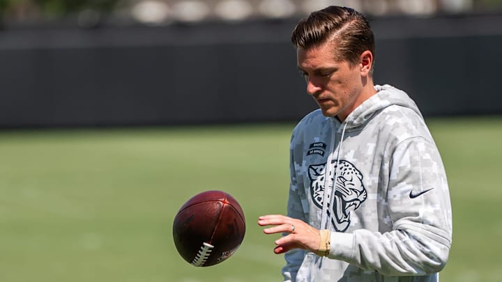 Jacksonville Jaguars general manager James Gladstone bounces the ball off the field after the Jacksonville Jaguars’ third mandatory minicamp Thursday June 12, 2025 at the Miller Electric Center in Jacksonville, Fla. [Doug Engle/Florida Times-Union]