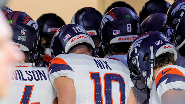 August 11, 2024, Indianapolis, Indiana, U.S: Denver Broncos quarterback Bo Nix (10) huddles with teammates prior to taking the field for the preseason game between the Denver Broncos and the Indianapolis Colts at Lucas Oil Stadium, Indianapolis, Indiana. 