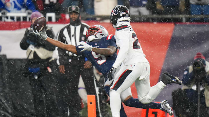 Jan 18, 2026; Foxborough, MA, USA; England Patriots wide receiver Kayshon Boutte (9) catches the ball for a touchdown in the fourth quarter against the Houston Texans in an AFC Divisional Round game at Gillette Stadium. Mandatory Credit: David Butler II-Imagn Images
