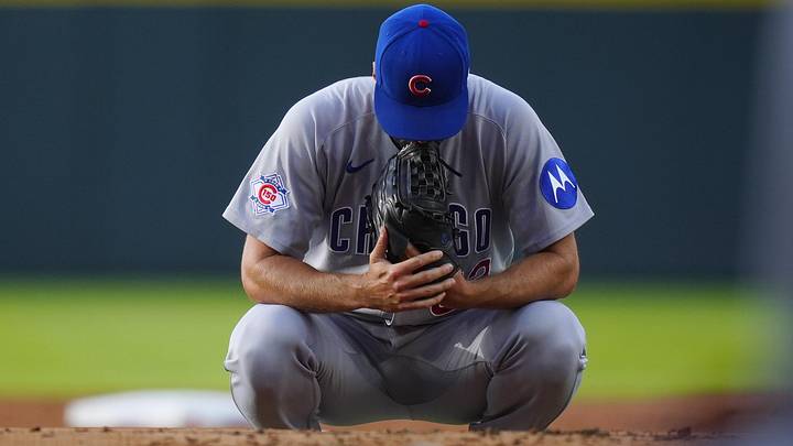 Jun 9, 2026; Denver, Colorado, USA; Chicago Cubs starting pitcher Colin Rea (53) kneels before taking the mound in the first inning against the Colorado Rockies at Coors Field. Mandatory Credit: Ron Chenoy-Imagn Images
