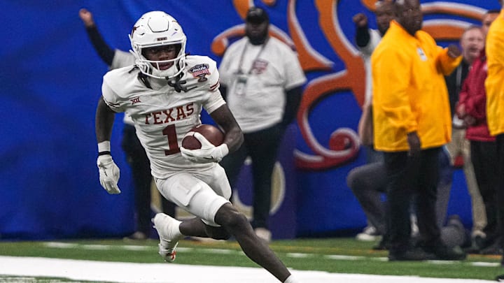 Texas Longhorns wide receiver Xavier Worthy (1) runs the ball during the Sugar Bowl College Football Texas Longhorns wide receiver Xavier Worthy (1) runs the ball during the Sugar Bowl College Football