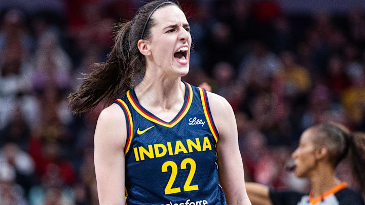Indiana Fever guard Caitlin Clark (22) celebrates a made basket in the first half against the New York Liberty at Gainbridge Fieldhouse. Indiana Fever guard Caitlin Clark (22) celebrates a made basket in the first half against the New York Liberty at Gainbridge Fieldhouse.
