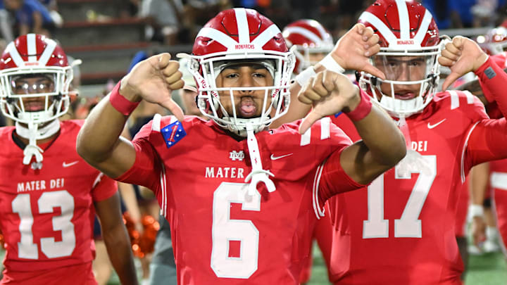 Mater Dei football players gesture during a game against Bishop Gorman in last fall's big nationally-ranked matchup.