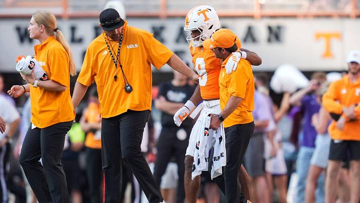 Tennessee wide receiver Joakim Dodson (9) is helped off the field during a Tennessee football game against Furman at Neyland Stadium in Knoxville, Tenn., on Sept. 5, 2026. Tennessee wide receiver Joakim Dodson (9) is helped off the field during a Tennessee football game against Furman at Neyland Stadium in Knoxville, Tenn., on Sept. 5, 2026.