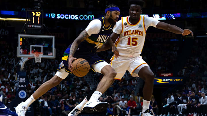 Feb 7, 2023; New Orleans, Louisiana, USA;  New Orleans Pelicans forward Brandon Ingram (14) drives to the basket against Atlanta Hawks center Clint Capela (15) during the second half at Smoothie King Center.
