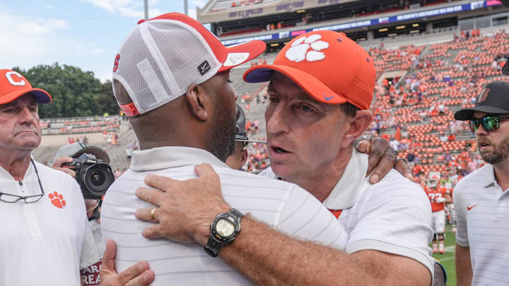 Syracuse HC Fran Brown reflects on Syracuse’s historic first win at Clemson, praising Dabo Swinney and the Tigers’ defense.