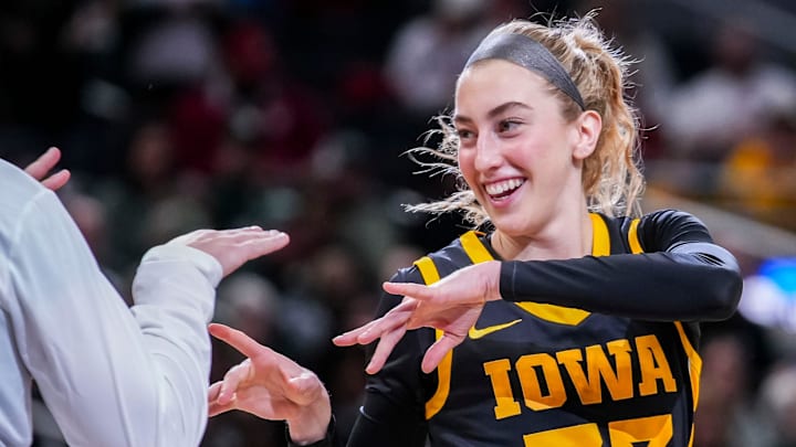 Iowa Hawkeyes guard Lucy Olsen (33) gets introduced Thursday, March 6, 2025, in a round two game at the 2025 TIAA Big Ten Women's Basketball Tournament between the Iowa Hawkeyes and the Michigan State Spartans at Gainbridge Fieldhouse in Indianapolis.